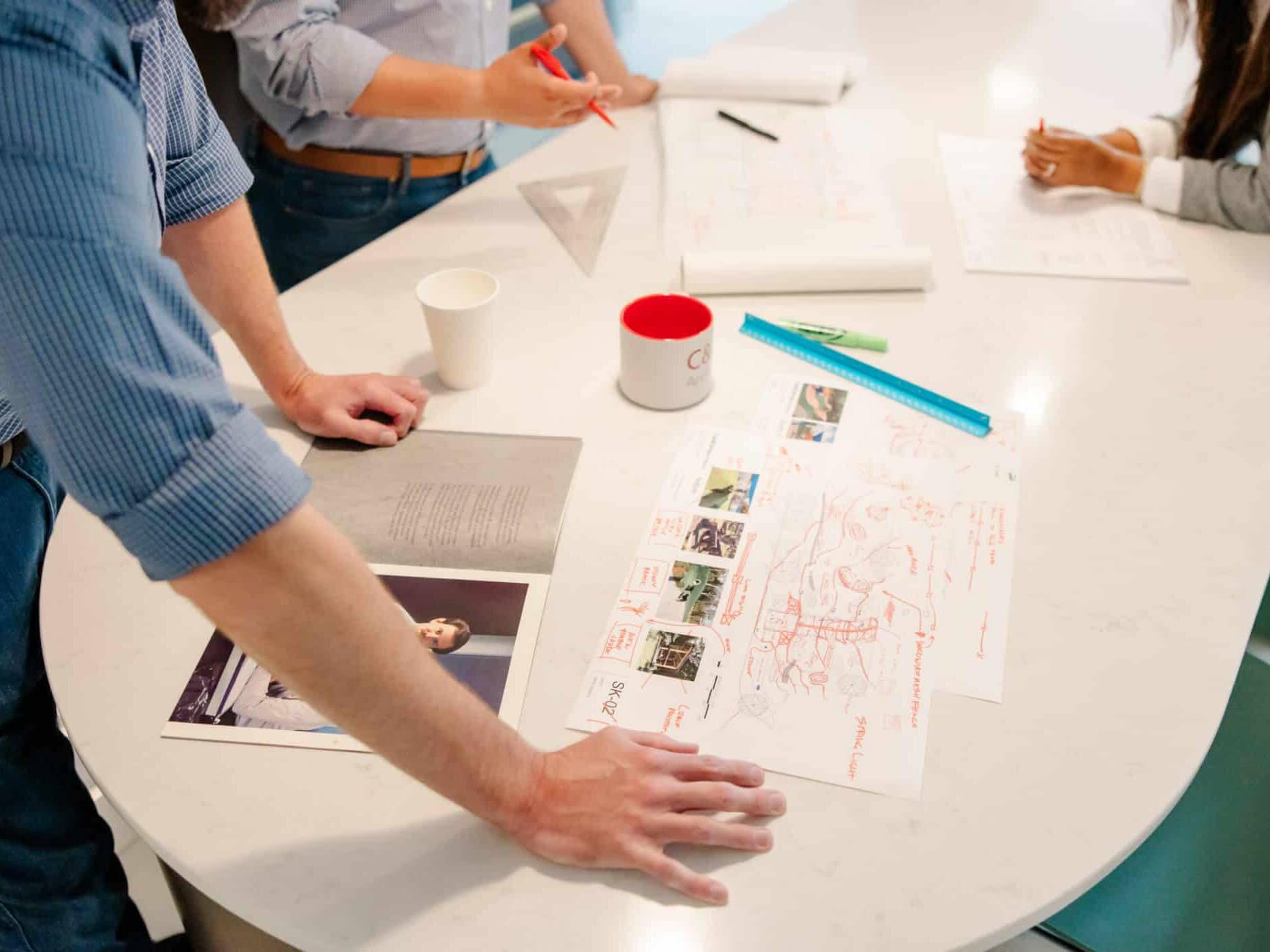 Cole & Denny Architects looking at plans