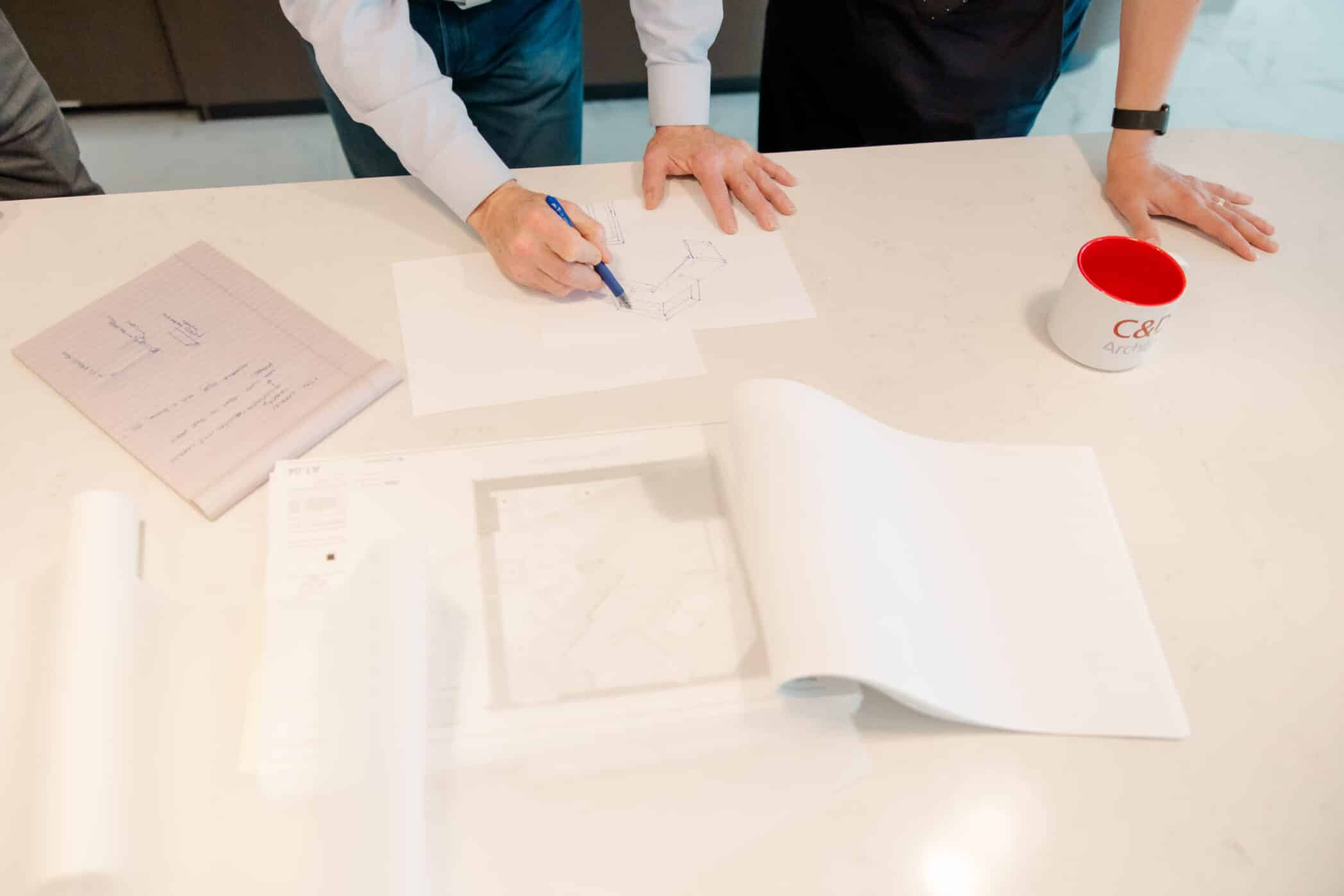 Cole & Denny Architects looking at plans